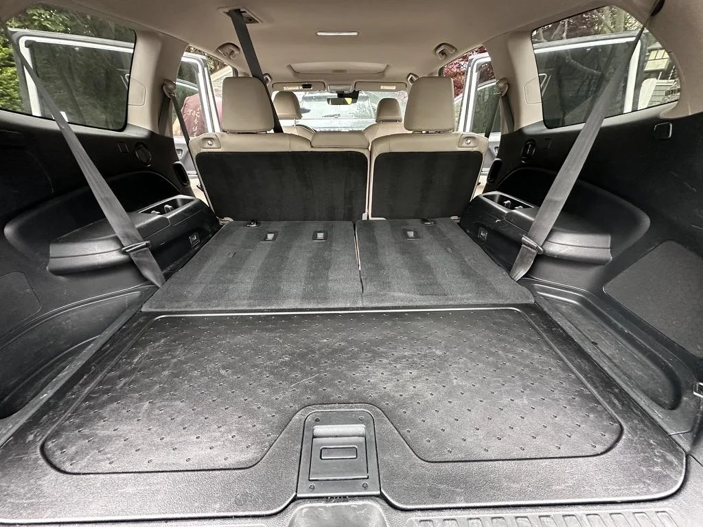 Spotless, freshly detailed SUV interior with the rear seats folded flat